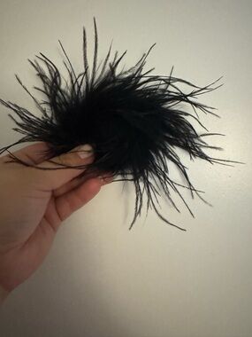 Resell Feather Pom brooch in Black